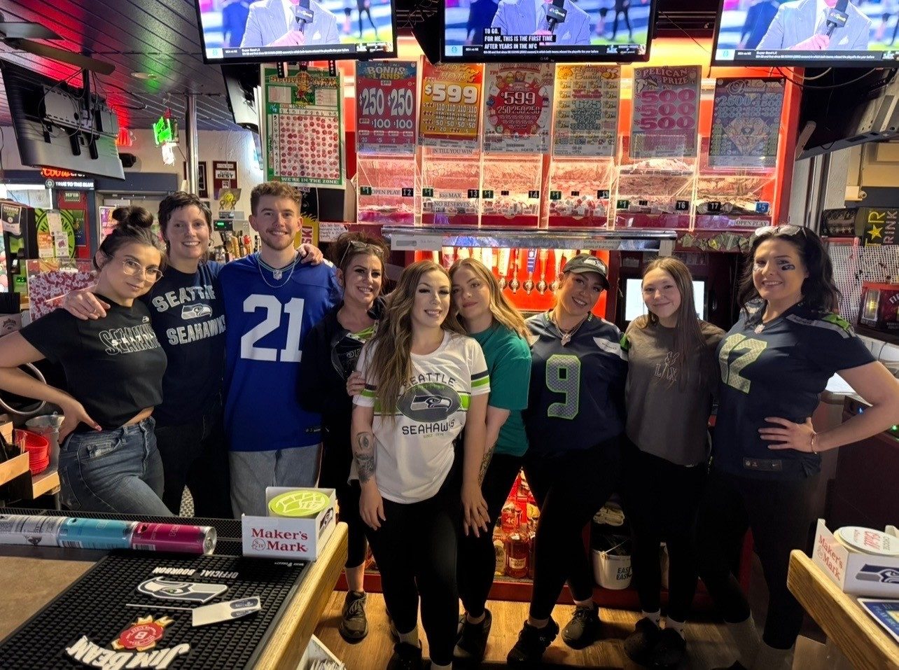 Sam's Saloon crew repping Seattle Seahawks gear on game day in Kennewick, WA